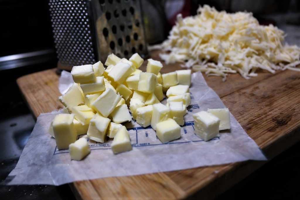 cubed-butter-shredded-cheese